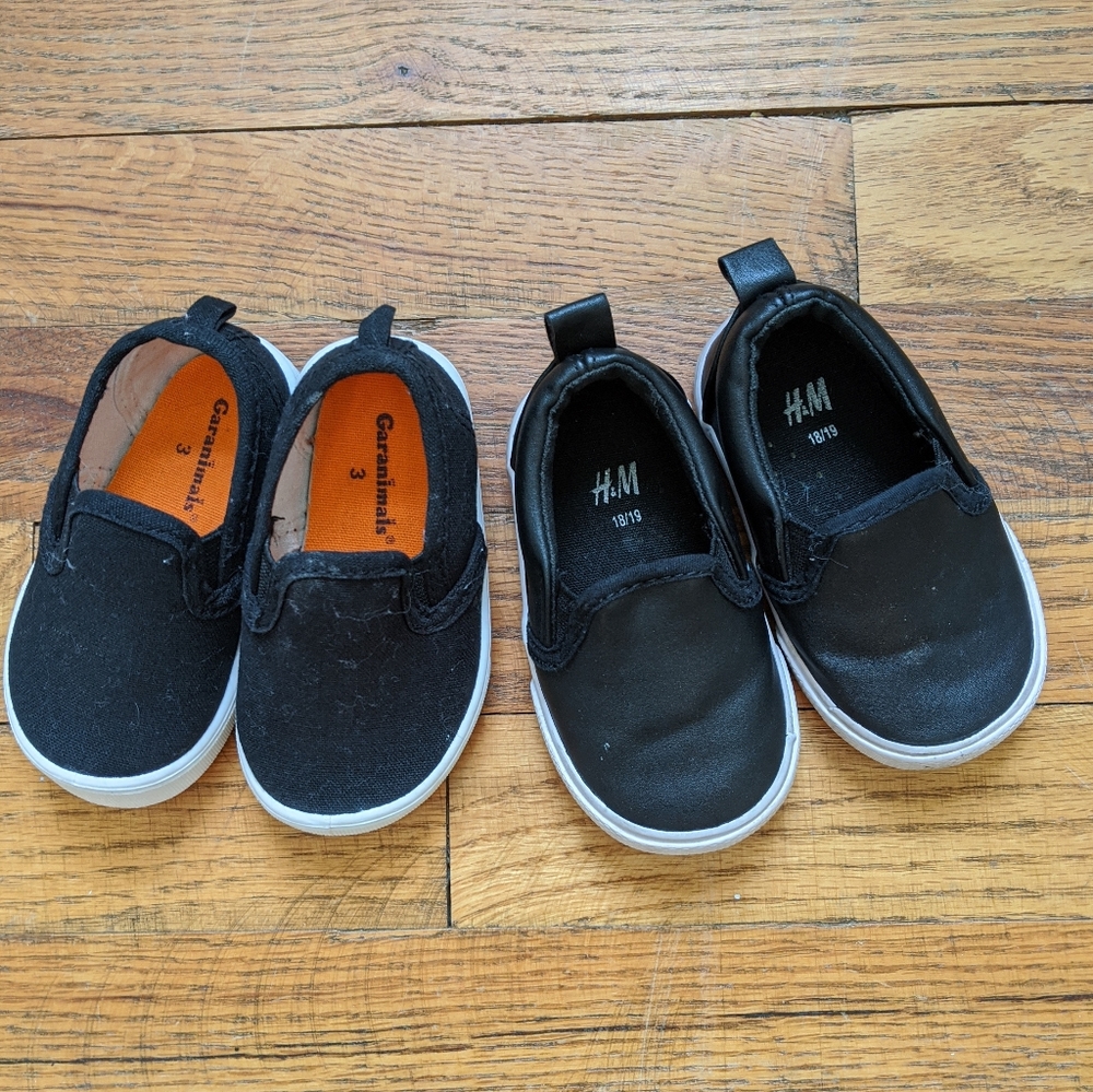 2 pairs of black slip ons